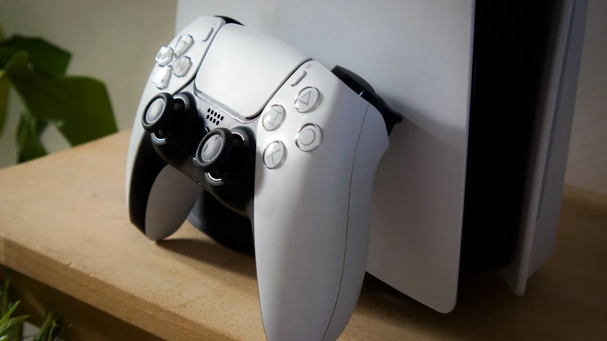 A PlayStation 5 console and DualSense controller.